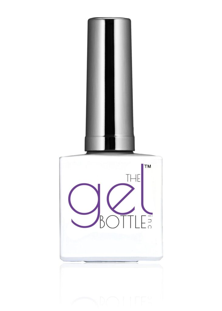 A white bottle of The GelBottle Inc premium polish, the professional product used for long-lasting BIAB nails Canggu at Moiselle, a top-rated nail studio Bali.